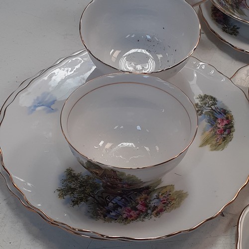 39 - Quantity of Royal Vale tea service, mainly in trios and includes teapots