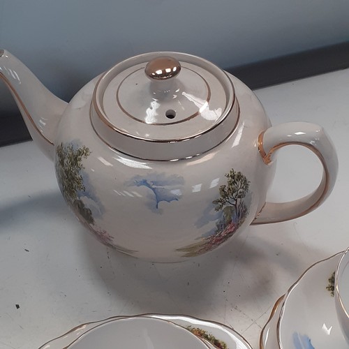 39 - Quantity of Royal Vale tea service, mainly in trios and includes teapots