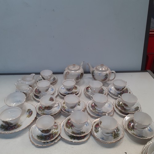 39 - Quantity of Royal Vale tea service, mainly in trios and includes teapots