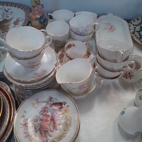 192 - Mixed lot of china plates cups, saucers, cake stands, sandwich plates etc