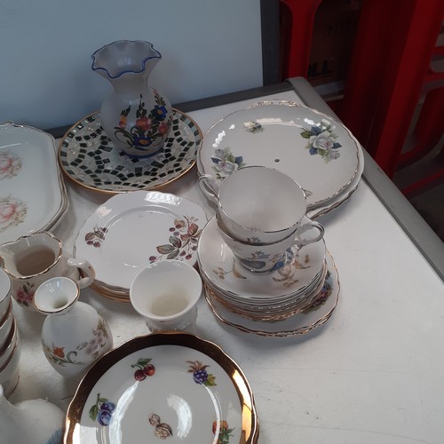 192 - Mixed lot of china plates cups, saucers, cake stands, sandwich plates etc