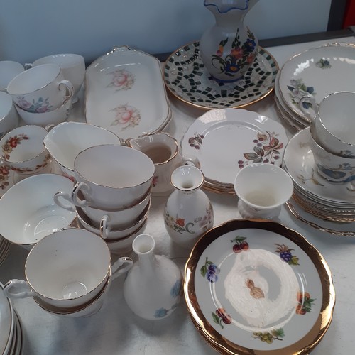 192 - Mixed lot of china plates cups, saucers, cake stands, sandwich plates etc