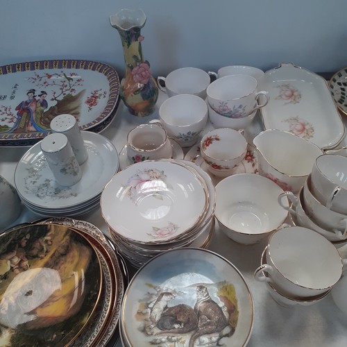 192 - Mixed lot of china plates cups, saucers, cake stands, sandwich plates etc