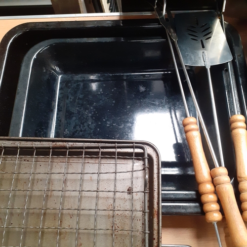 6 - Quantity of roasting tins and trays. Some brand new, never used. Included is a deep roasting tray ne... 