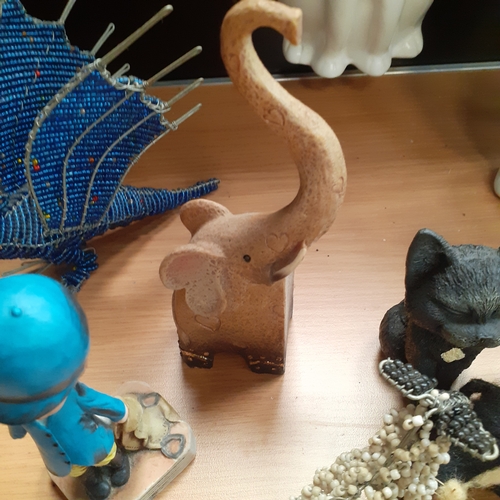 11 - Selection of interesting ornaments including elephants,  hanging cats, a dragon, metal Buddha and a ... 