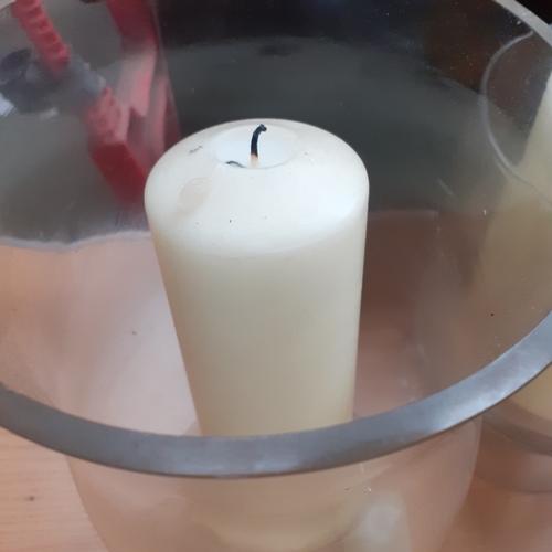 18 - Glassware containing candles and two battery candles (require batteries) The larger candles have ple... 