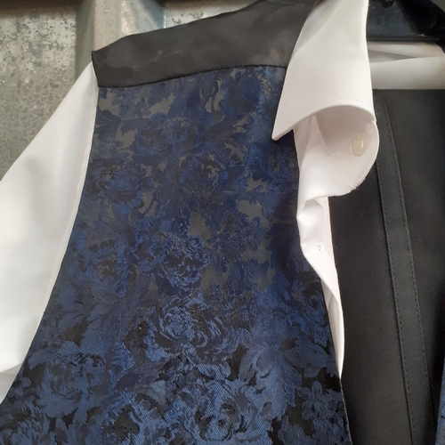 22 - Three pieces of dinner wear. Mens trousers, shirt and waistcoat. Good condition.