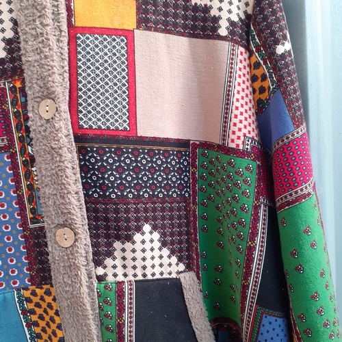 23 - Hooded patchwork material jacket. Says 4xl, doesn't look quite that big. Nice condition