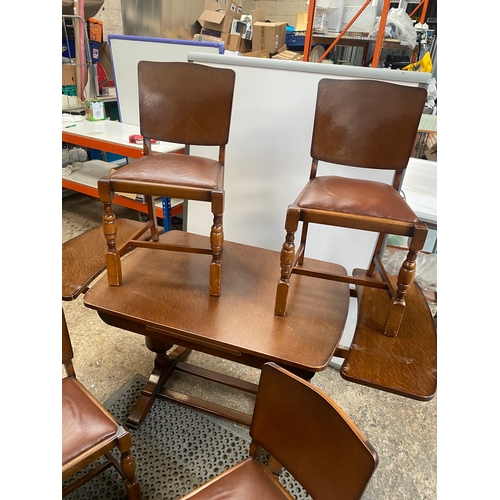 255 - Extending brown wood table with 4 chairs - great shabby chic project