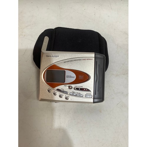 61 - Sharp MD-SR60 portable minidisc player with case & power supply