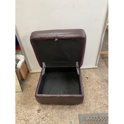 390 - Brown leather foot stool with lift up top for storage