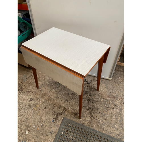 398 - Formica drop leaf table