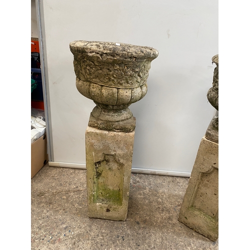 450 - Pair of heavy stone planters on rectangular plinths