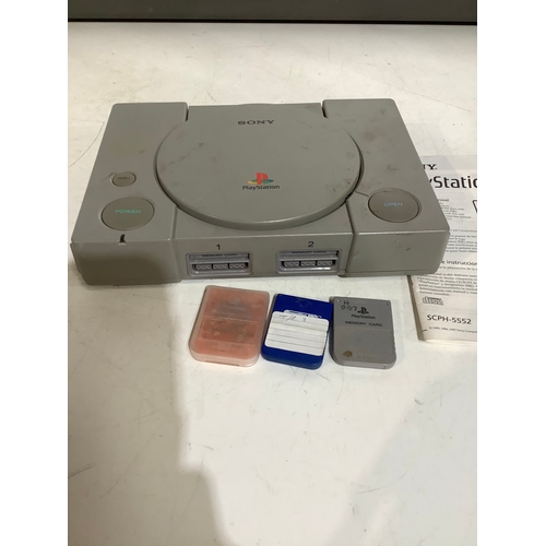 284 - Sony PlayStation 1 console and memory cards - no leads - tested and working