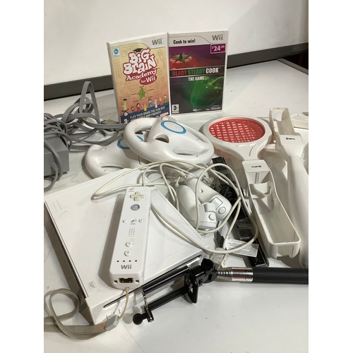 285 - Wii console two games and lots of accessories tested and working