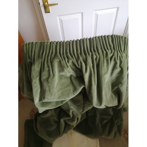 40A - Fully lined green velvet curtains Each curtain measures approximately 90 inches (230cm)wide and 57 i... 