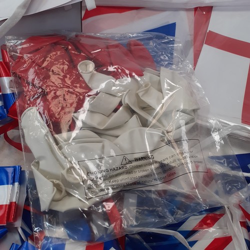 2 - A quantity of union flags, and St George’s flags. Four lots of bunting plus some individual.