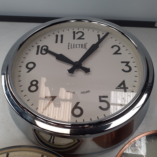 11 - Three kitchen wall clocks each battery operated and require the batteries. Overall nice condition