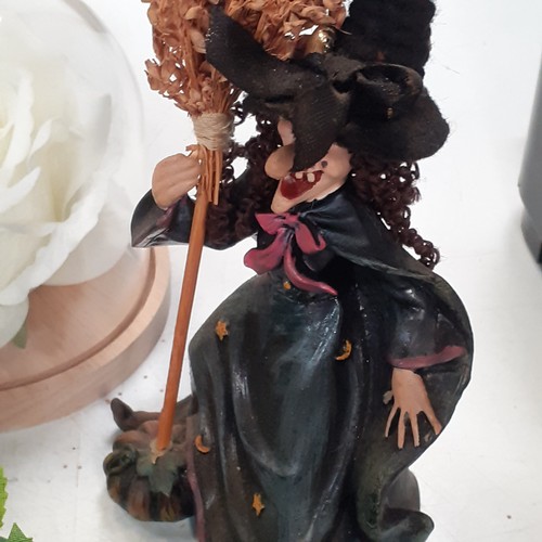 13 - Lot consisting of witchy type items, including artificial flowers, witch ornaments and more