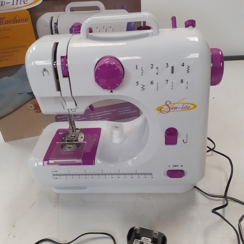 15 - Sew lite sewing machine. With accessories, pedal etc. Hardly used, very good condition. Tested and w... 