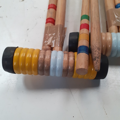 18 - Croquet set. Set of sticks, balls, pegs etc. Played with but good condition