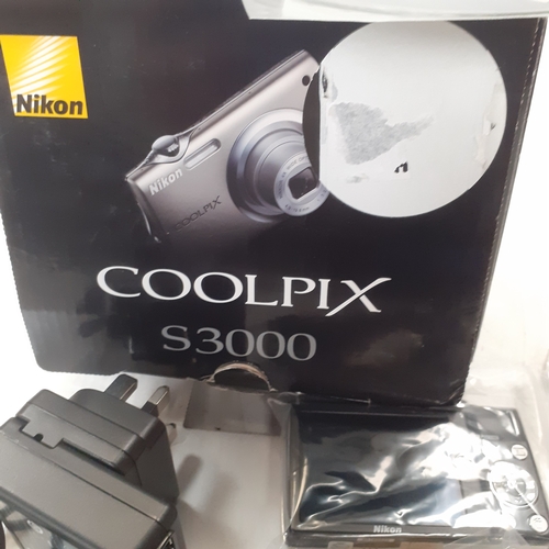 20 - Coolpix S3000 digital camera. All accessories, manuals and discs with camera, in little or unused ex... 