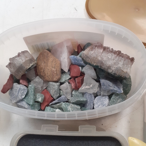 21 - A quantity of rock polishing/stone tumbling grit and rocks.