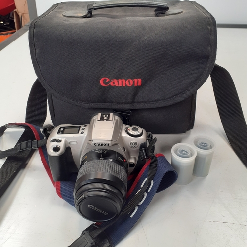 Canon EOS 300 SLR camera with 35-80mm zoom lens and case. Some minor ...