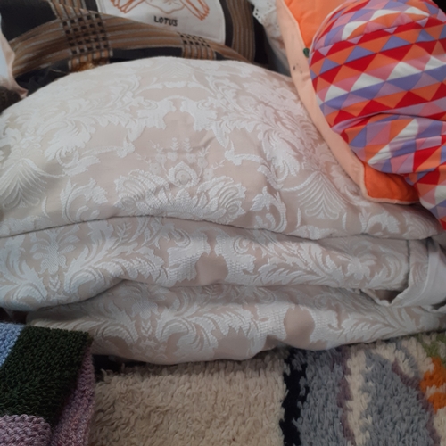 30 - 5 knitted blankets, 2 pairs of curtains, 4 cushions and a rug. Some pulls in the wool and z little s... 