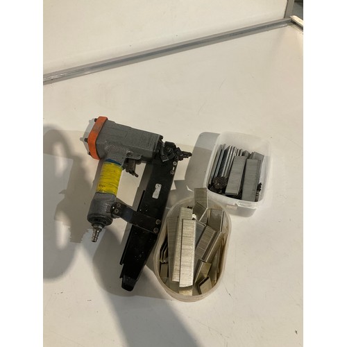 157 - Passlode staple gun and air line attachment and spare nails