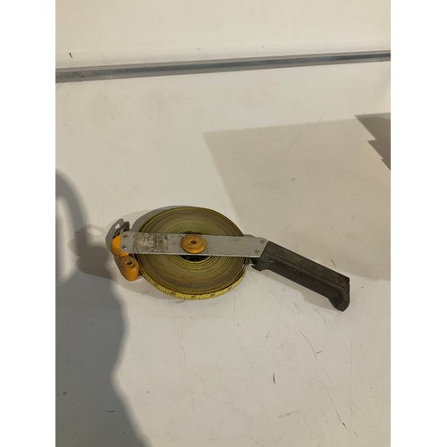 164 - workmans tape measure on reel