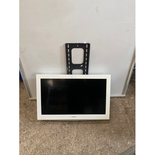 145 - Toshiba 32” white tv with bracket & remote