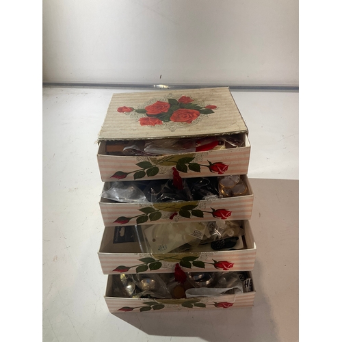 Small 4 drawer unit filled with vintage buttons