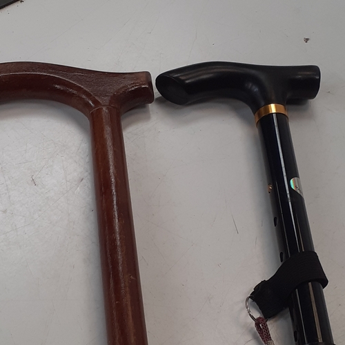 36 - 4 quality walking sticks. One brass head with intricate details,  one with a metal foot, a mobility ... 