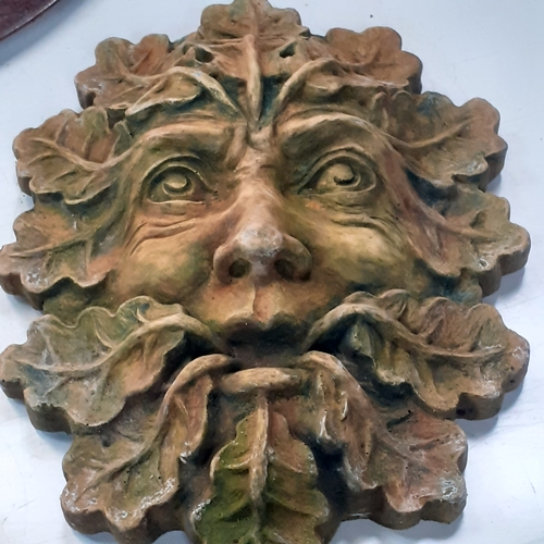 2 - Mixed lot of garden ornaments. Includes stoneware green man wall plaque and stoneware green man wall... 