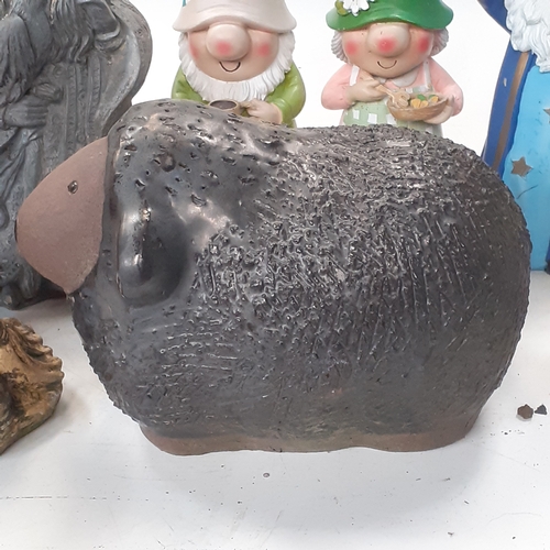 8 - Garden gnomes, wizard and a sheep. Most are stone, and a couple of moulded material. Some general we... 