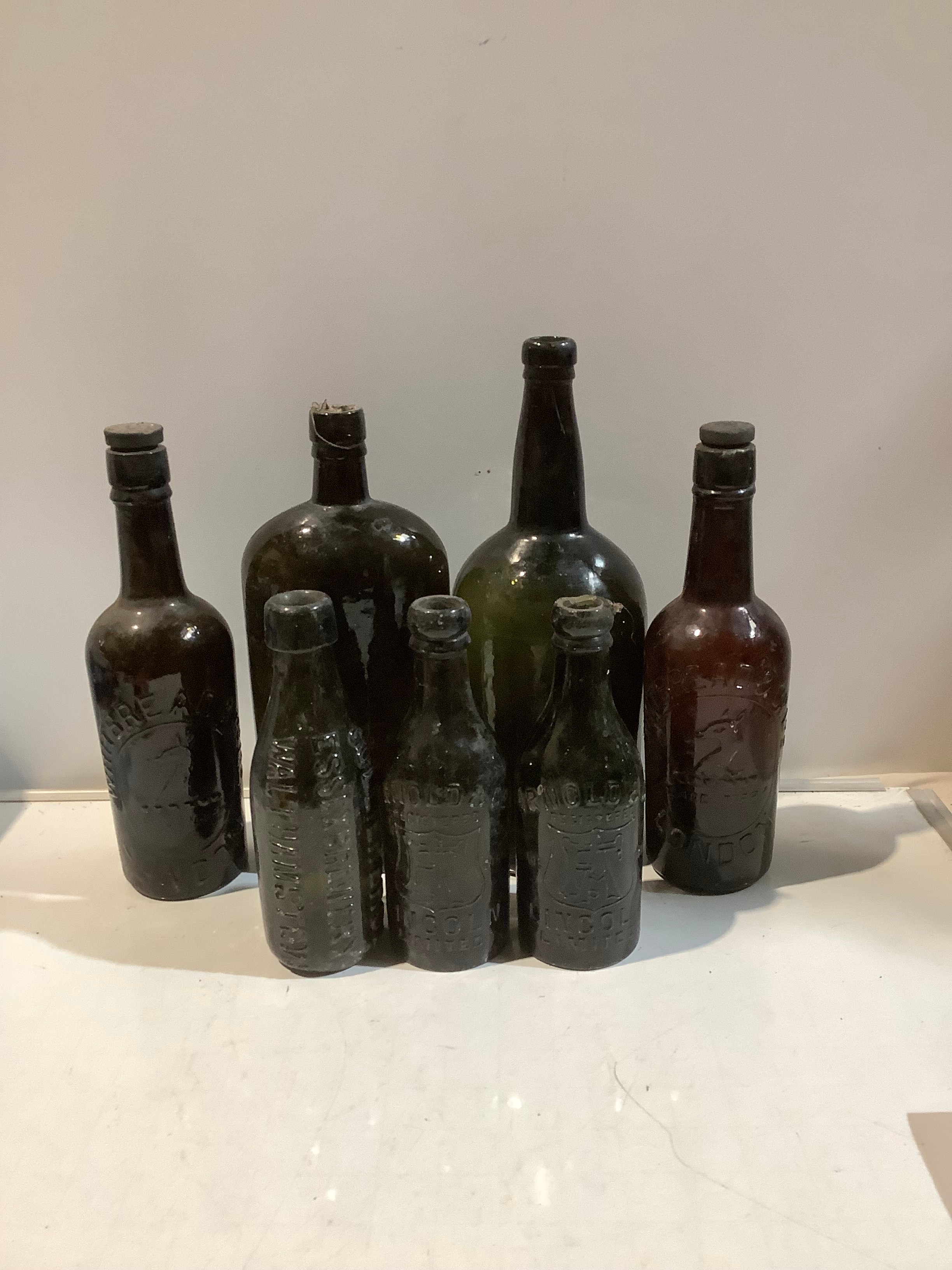 Several glass bottles to include whitbread Arnold and co Walthamstow ...