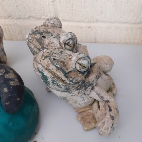 15 - Stone/concrete garden ornaments. Pair of cuddling frogs, a bear and 2 gnomes. All require some lovin... 