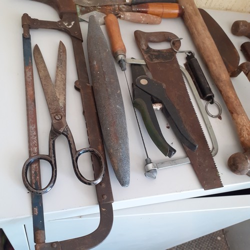 12 - A good quantity of mainly old hand tools. Includes hand 1lb clump hammer, a Sheffield made Marples s... 