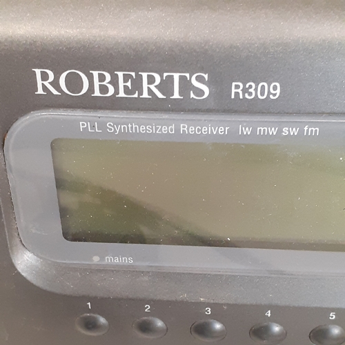 19 - Roberts 4 band radio, model R309, with cable. All working and in good condition except could do with... 