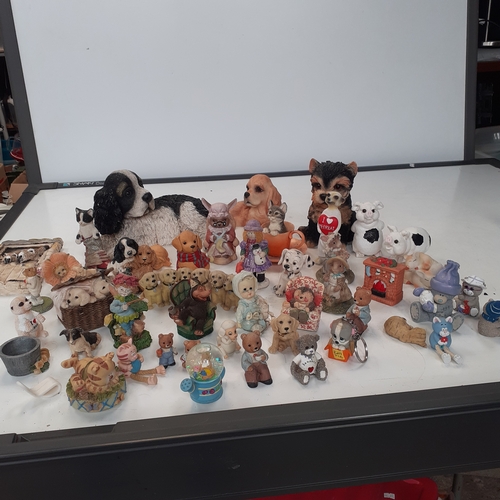 18 - Quantity of various different ornaments including dogs, cats, pigs, meerkat and more