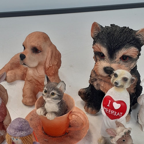 18 - Quantity of various different ornaments including dogs, cats, pigs, meerkat and more