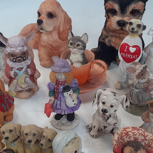 18 - Quantity of various different ornaments including dogs, cats, pigs, meerkat and more