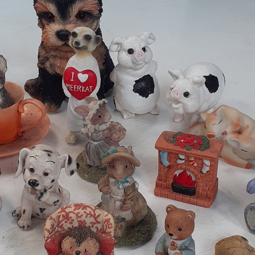 18 - Quantity of various different ornaments including dogs, cats, pigs, meerkat and more