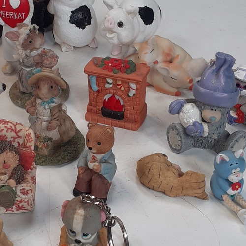 18 - Quantity of various different ornaments including dogs, cats, pigs, meerkat and more