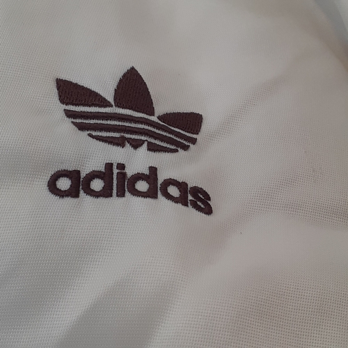 20 - A 1990s Addidas bomber jacket. Size XL Some very minor signs of wear but overall good condition.