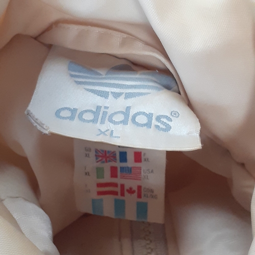 20 - A 1990s Addidas bomber jacket. Size XL Some very minor signs of wear but overall good condition.