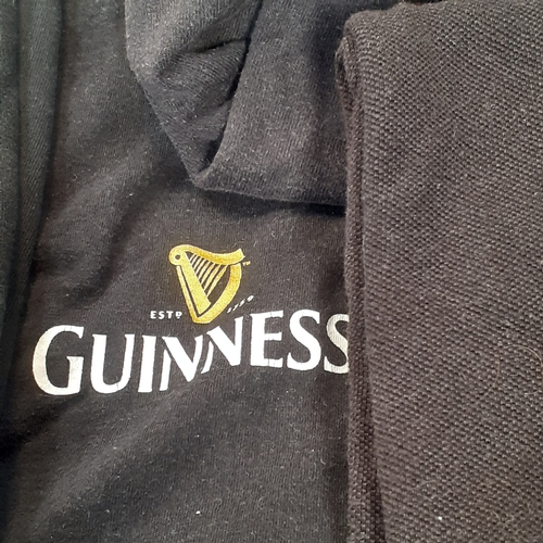 22 - A Guiness clothing bundle. Includes his and hers dressing gowns and 5 t-shirts. Sizes are larger siz... 