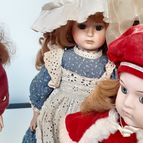 26 - Old porcelain dolls x 4. Need a clean up due to storage, however,  there is no damage to the dolls t... 