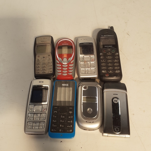 28 - Selection of 8 old style mobile phones.  Mostly Nokia with one or two other models.